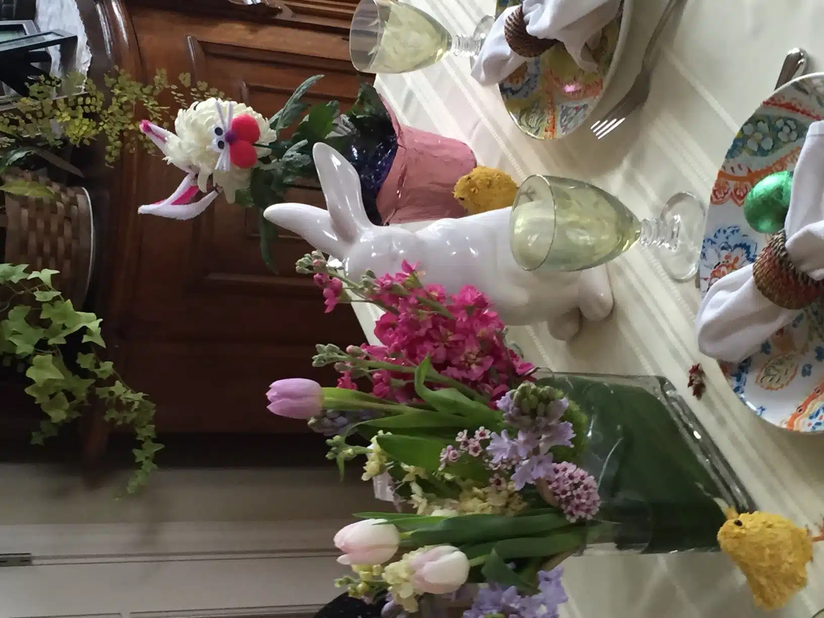 Easter table setting with flowers and decorations