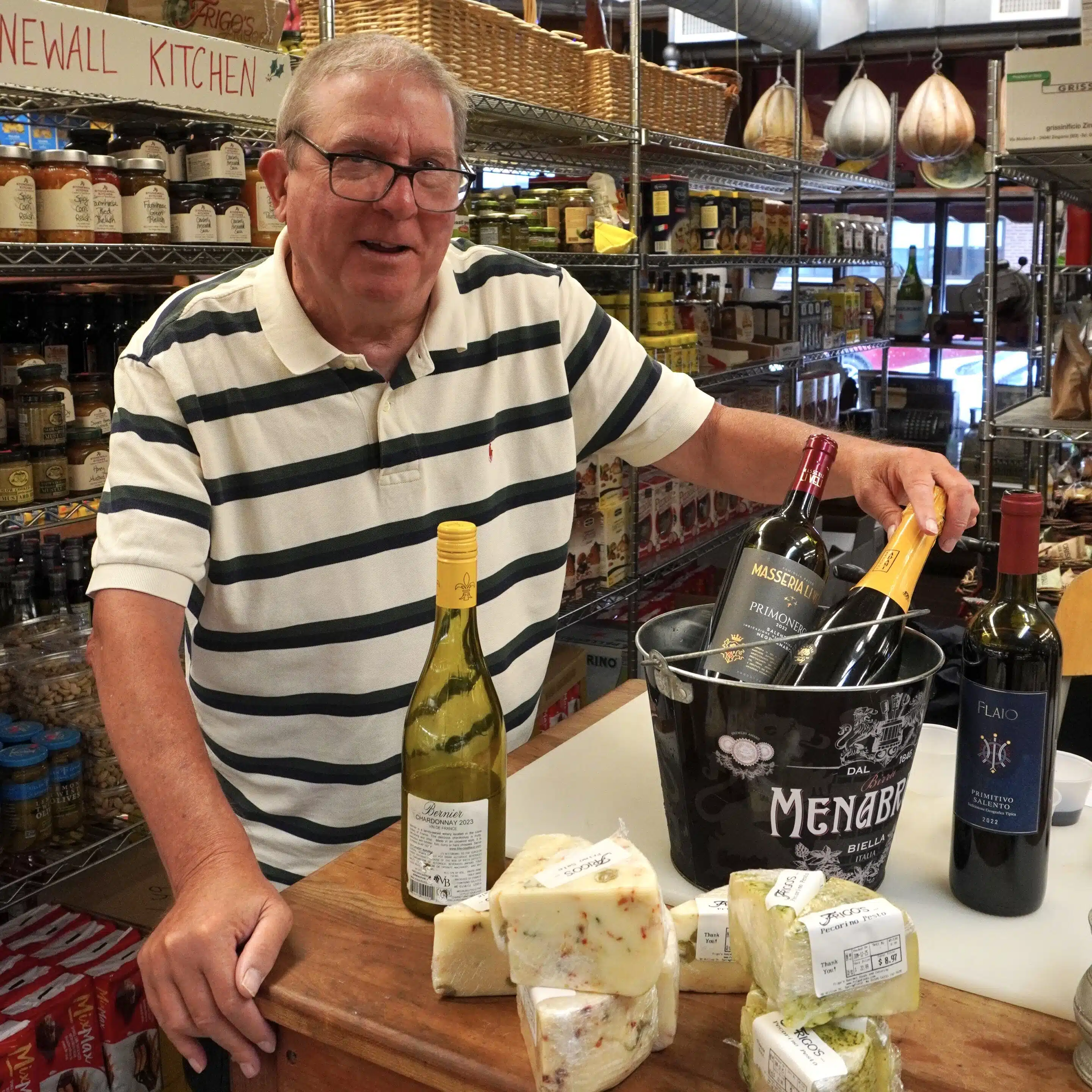 Earl the Wine Guy showcasing wine and cheese