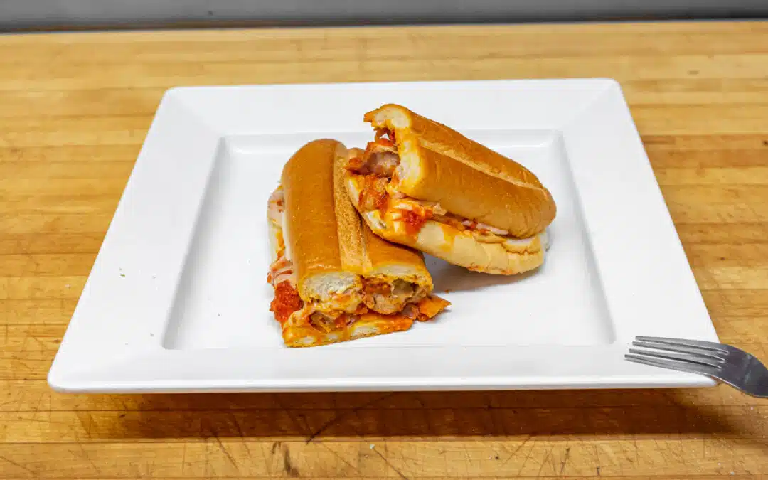 Sweet Sausage sandwiches on a white plate