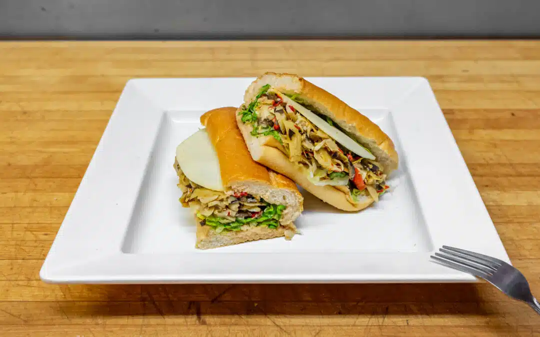 Two vegetarian sandwiches on a plate