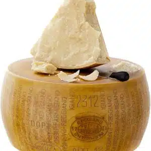 Wheel of Parmesan cheese with knife