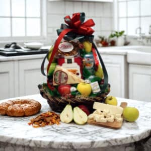 Fruit Gourmet Gift Basket balanced with sweet fresh-fruit inspired treats and savory imports in a hand-woven basket