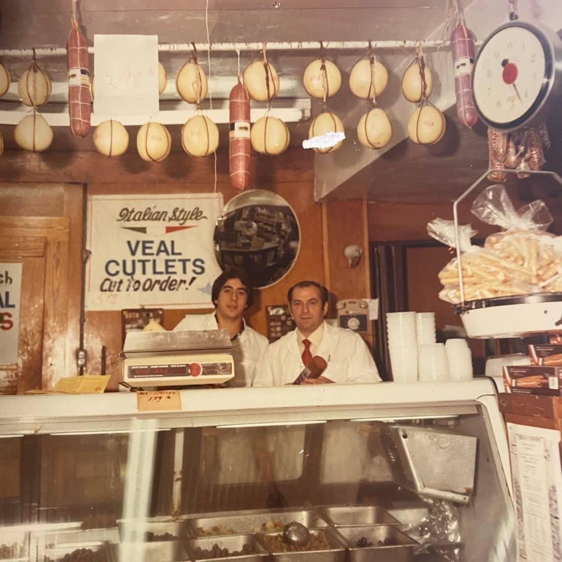 Takeout Menu Vintage photo of the Frigo family behind the deli counter